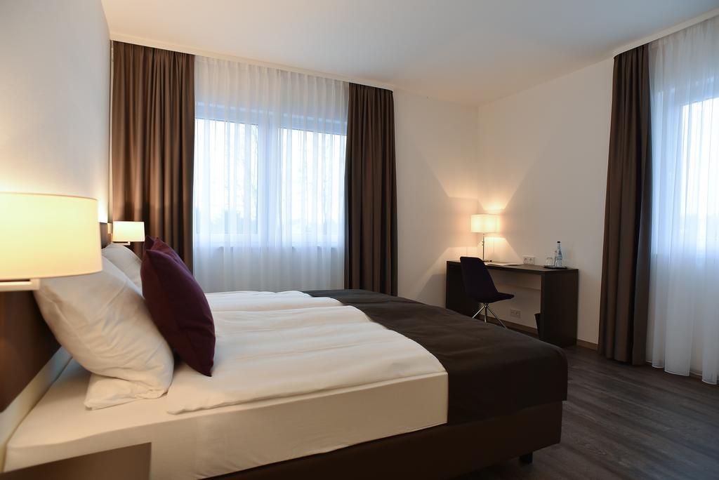 Guesthouse Lichtenau Nußloch Pokoj fotografie